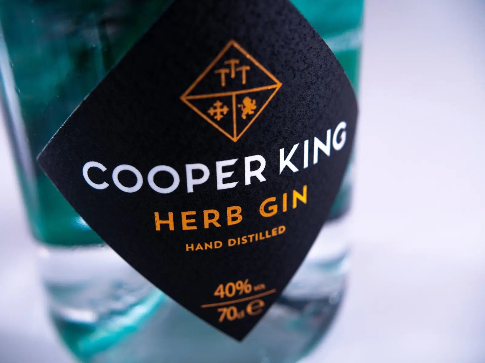 Closeup of the label of a bottle of Cooper King Herb Gin
