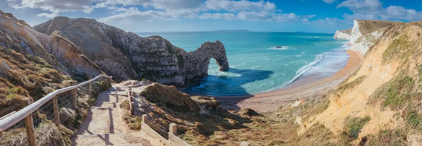 A clifftop view of a beach in south-west england