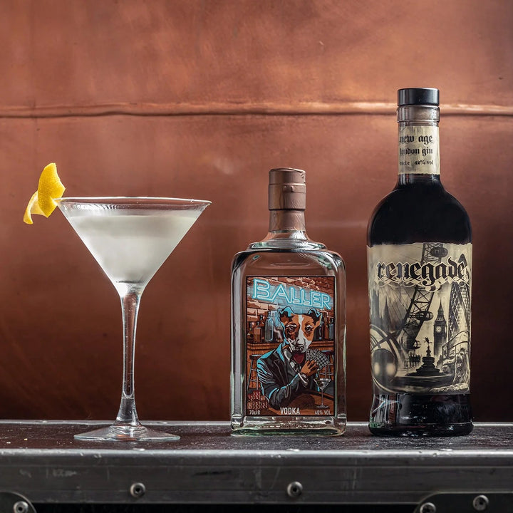 Vesper Martini Cocktail with a bottle of Baller Vodka and a bottle of Renegade Gin from Doghouse Distillery