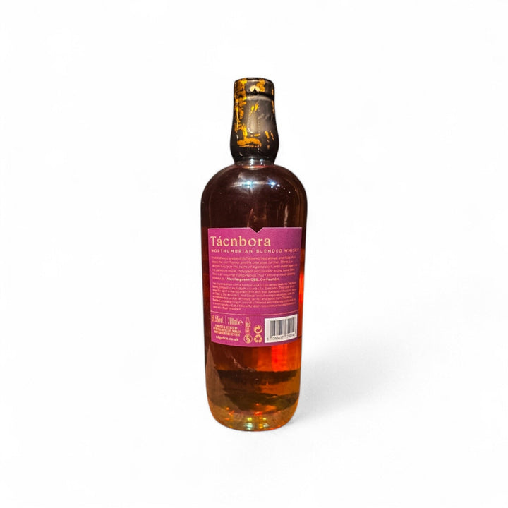 Bottle of Tácnbora Ruby Port Cask whisky bottle view of rear label on a white background