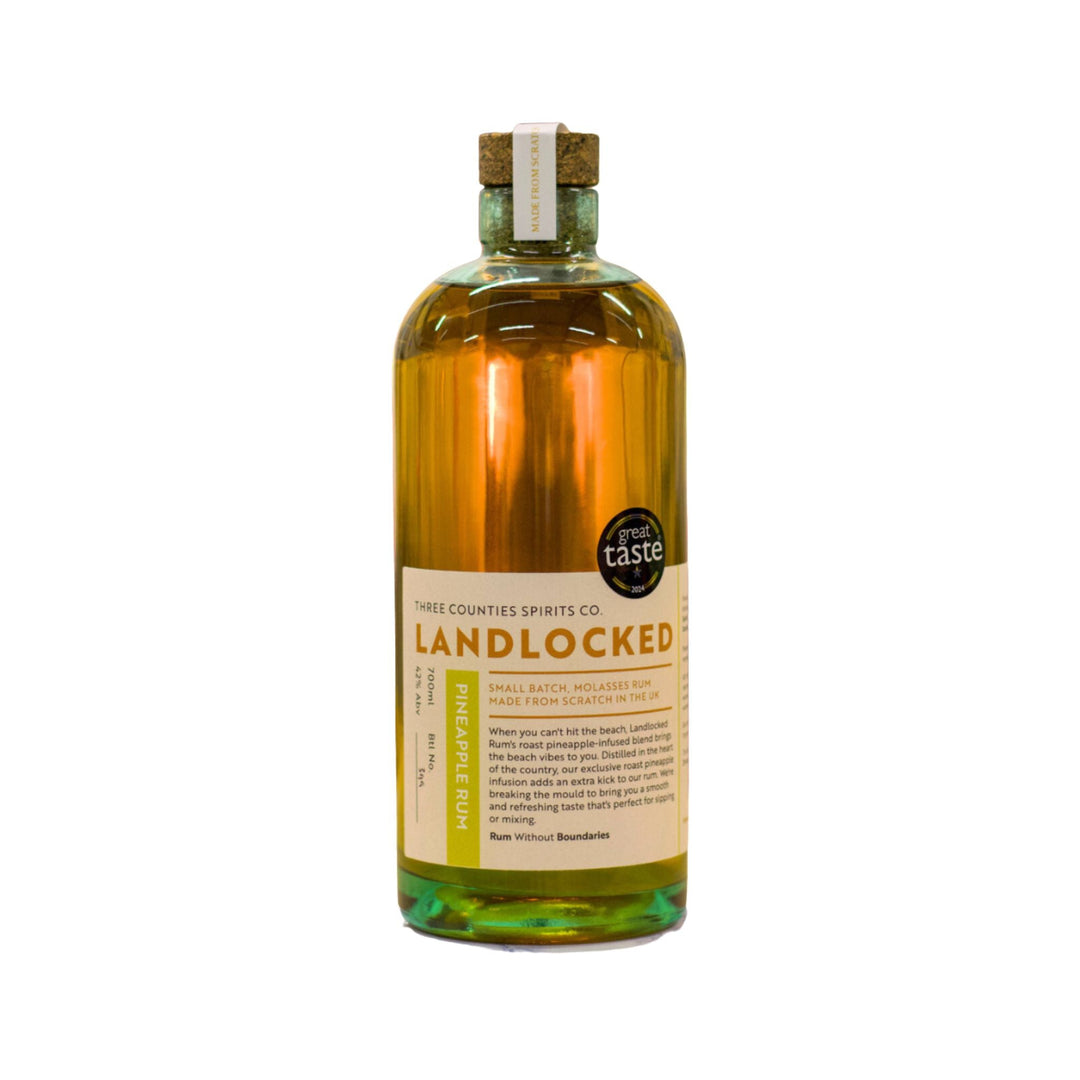 Bottle of Landlocked Pineaple Rum on a white background