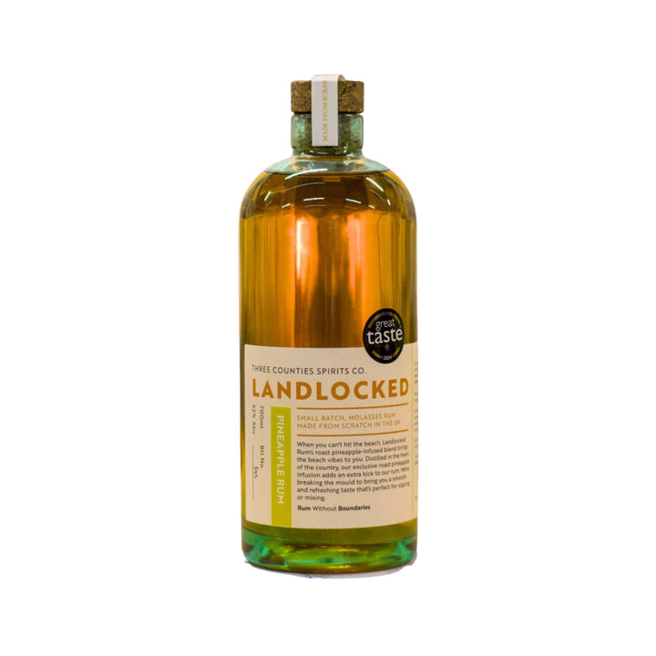 Bottle of Landlocked Pineaple Rum on a white background