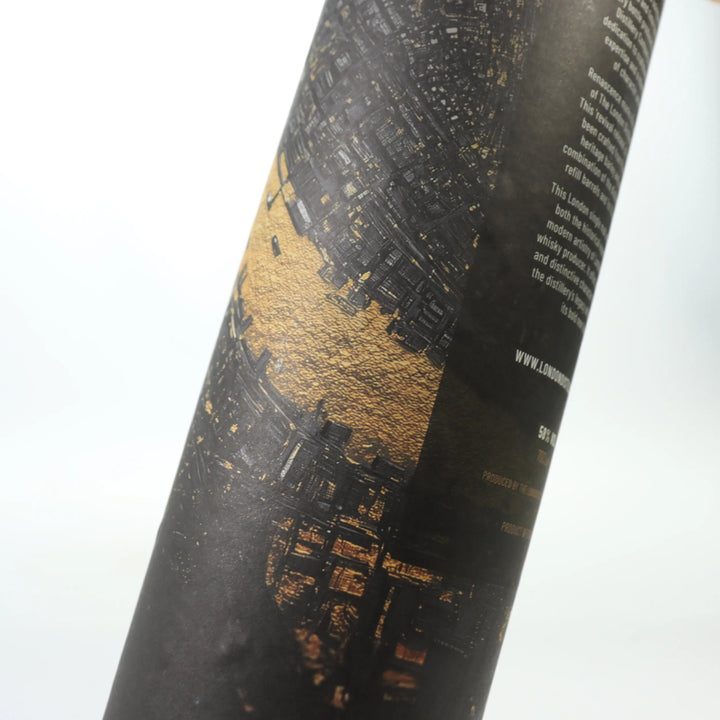 Close up of The London Distillery Company's 'Renascence' whisky packaging tube on a white background