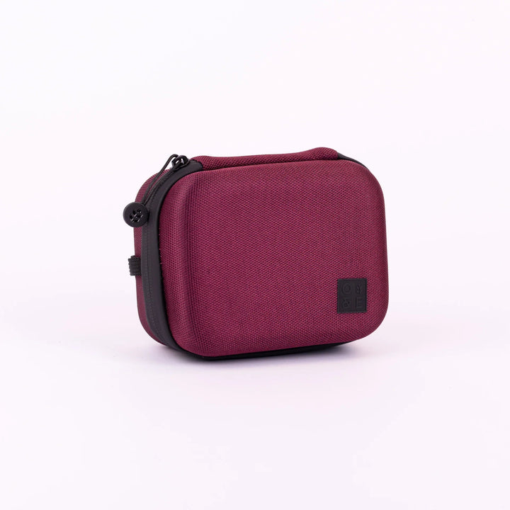Oak &amp; Ember Mini Glask Traveller Set in a red carrying case with black accents on a white background