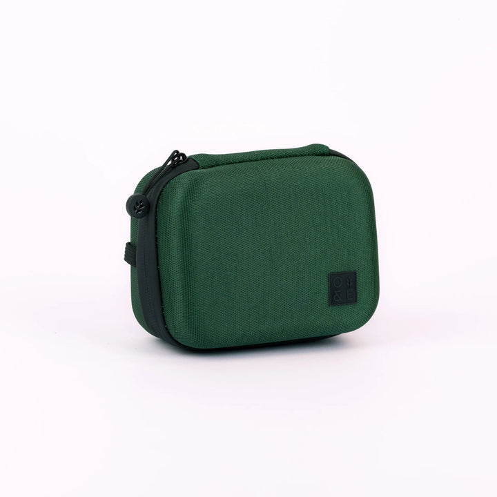 Oak &amp; Ember Mini Glask Traveller Set in a green carrying case with black accents on a white background