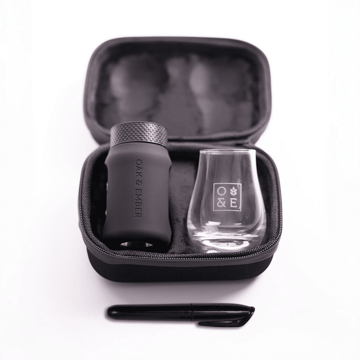 Oak &amp; Ember Mini Glask Traveller product set with glass and pen in open case on white background