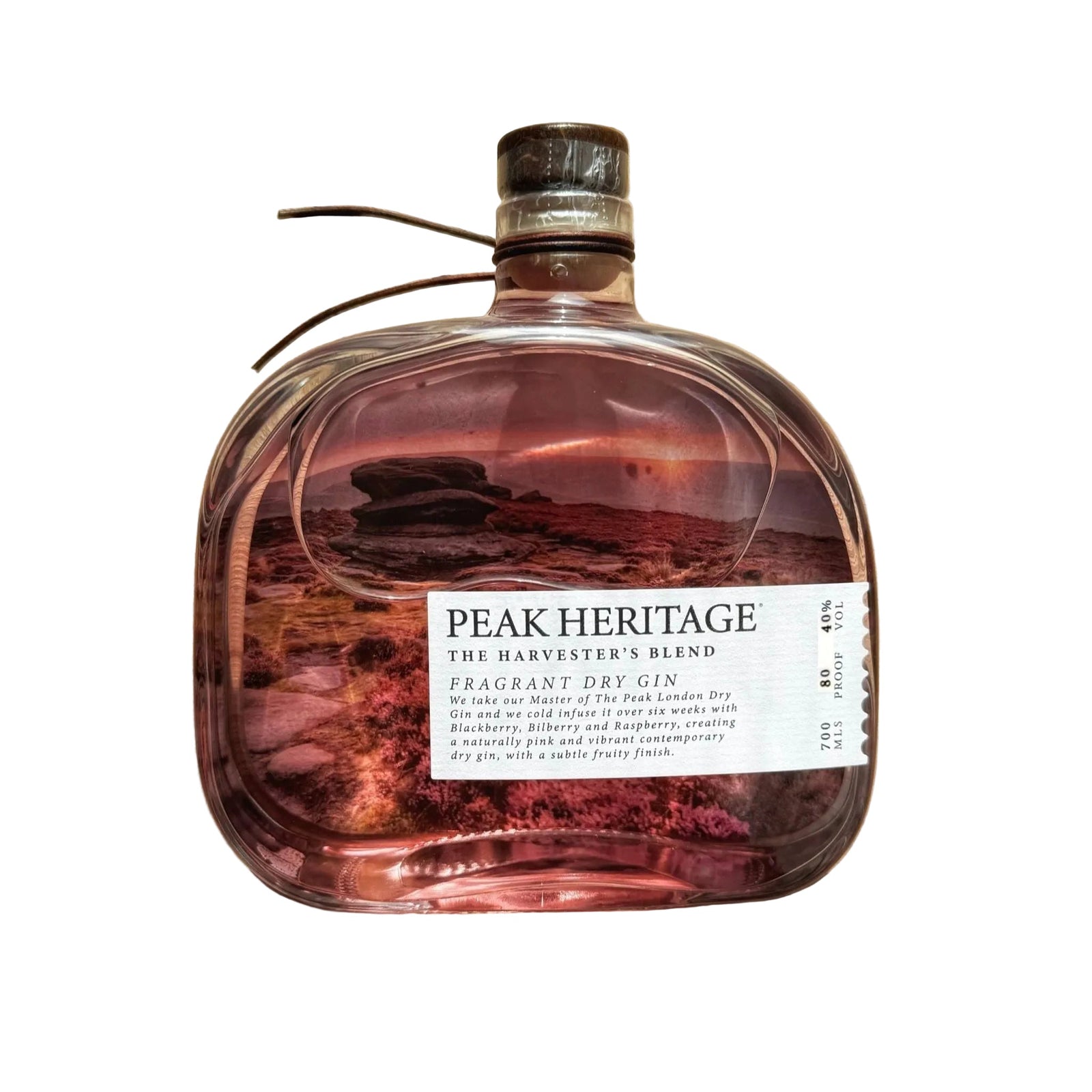 Bottle of Peak Heritage gin on a wooden surface