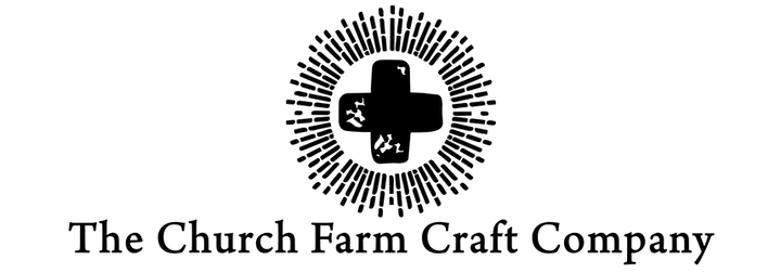 Logo of The Church Farm Craft Company with a cross design on a white background
