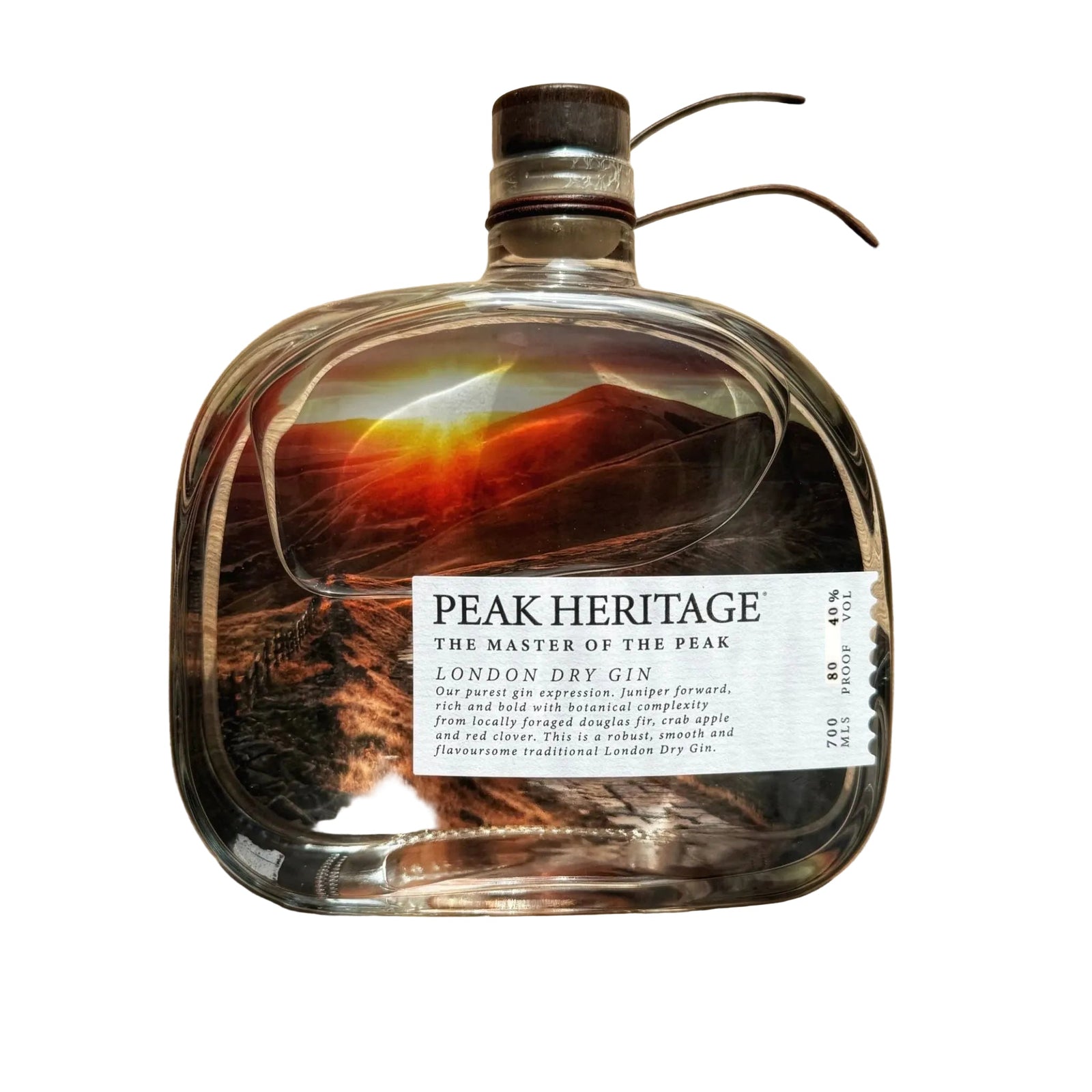 Peak Heritage gin bottle on a wooden surface