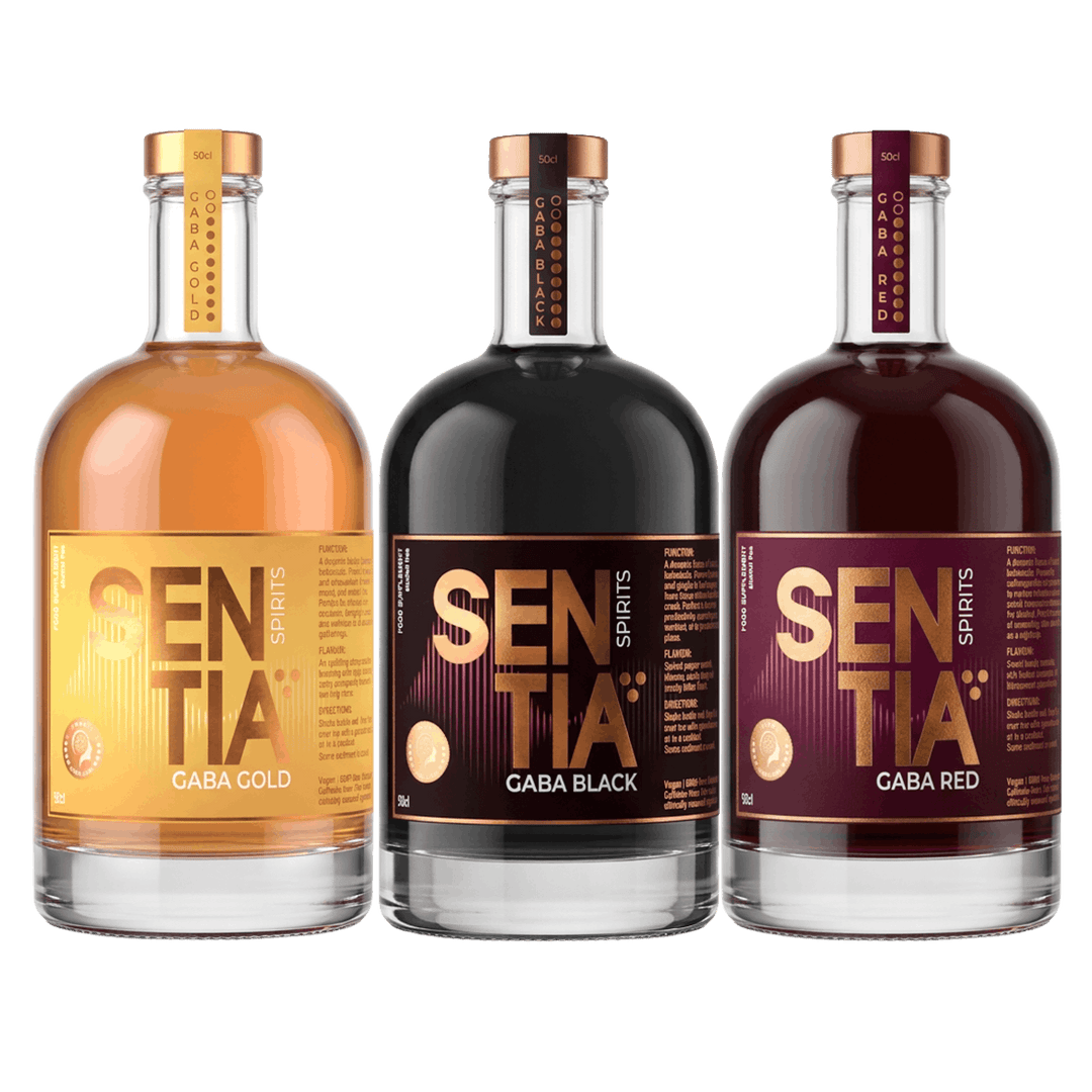Three bottles of SENTIA Spirits gaba supplements lined up against a solid black background. From left to right, the bottles contain Gaba Gold (amber liquid), Gaba Black (dark liquid), and Gaba Red (deep red-brown liquid), each with a metallic copper cap and a matching gradient label.