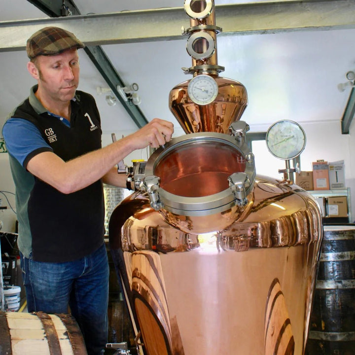 Michael Yeoman Distiller at The Spirit of the Downs working the still- Digital Distiller