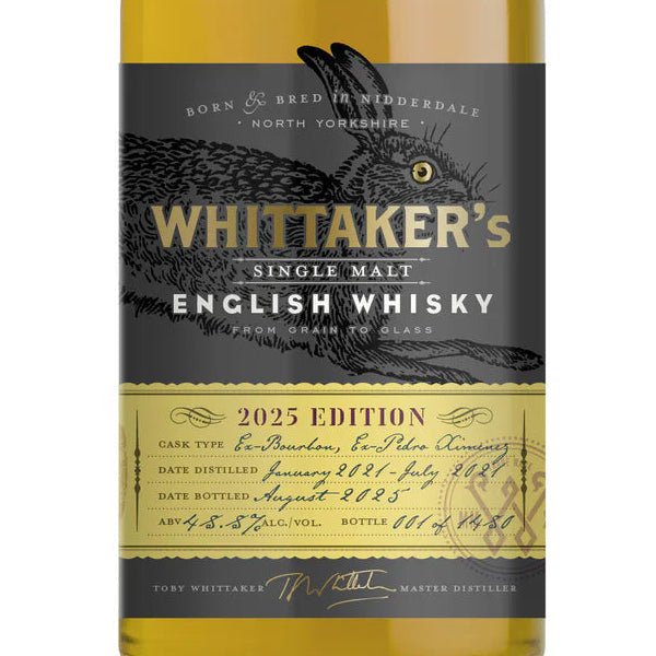 Whittaker's English Whisky bottle label closeup on a white background