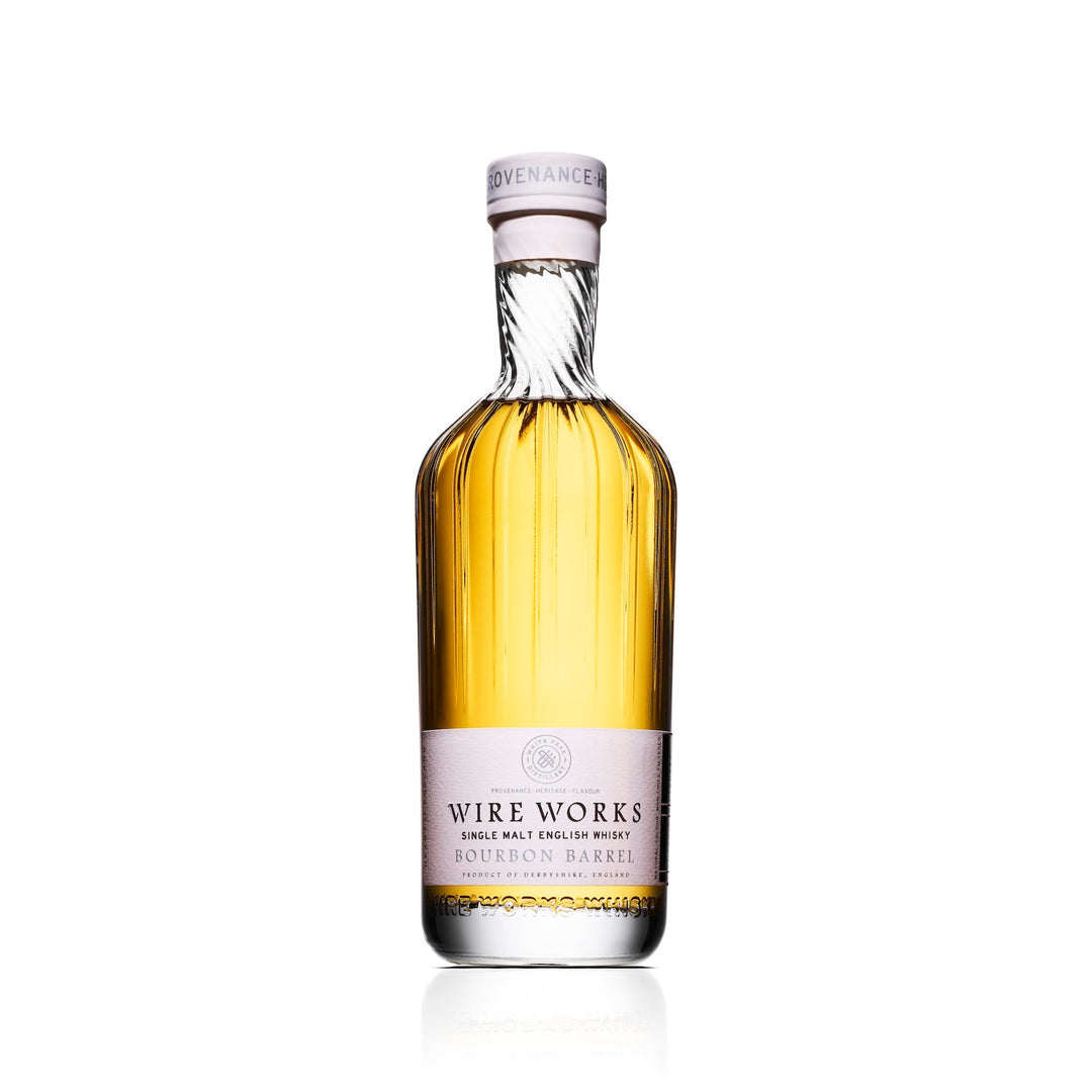 Bottle of Wire Works Bourbon barrel whisky on a white background